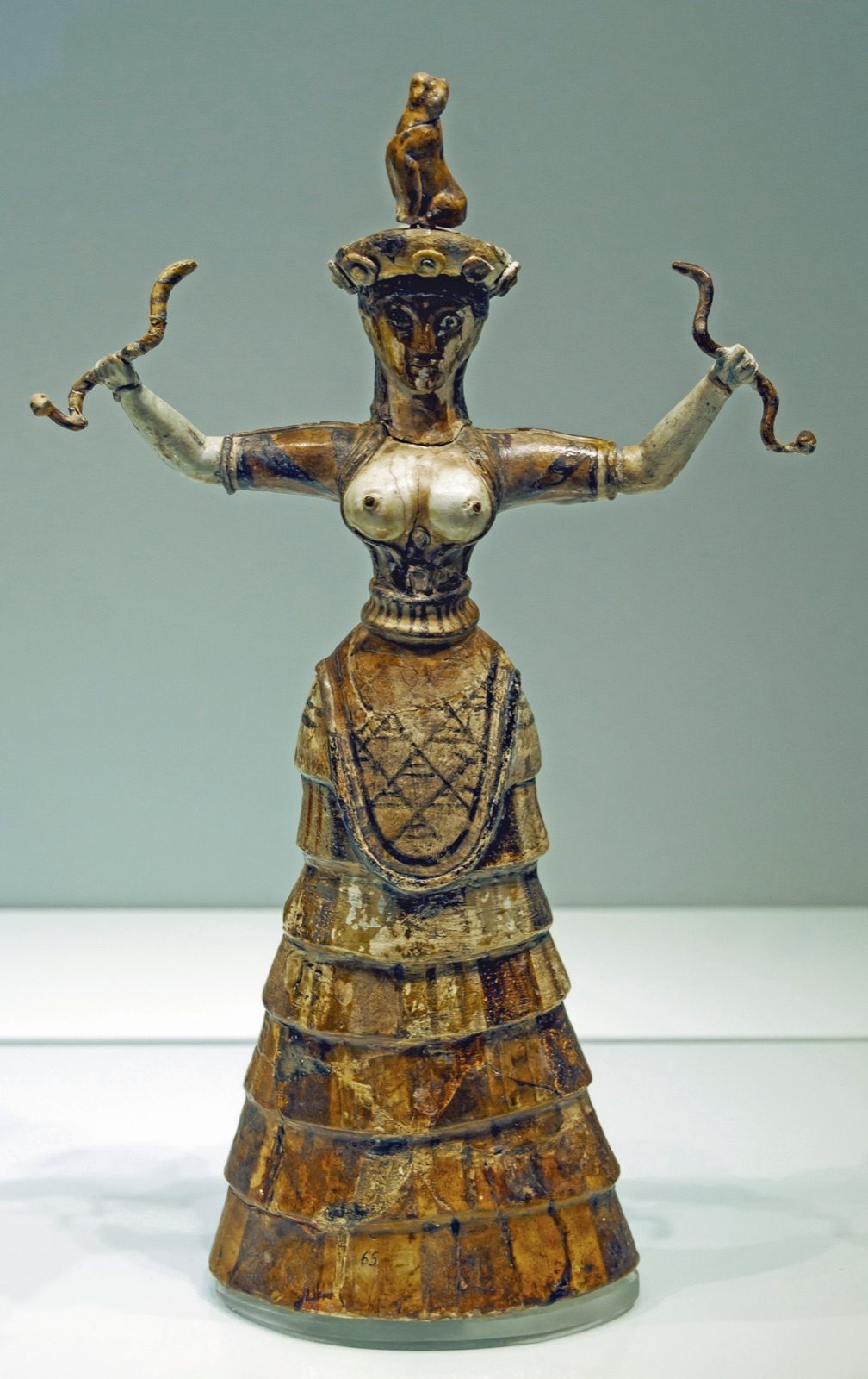 A faience Snake Goddess figurine excavated by Arthur Evans at the Bronze Age palace of Knossos on Crete, one of the figurines Evans concluded in 1901 represented a single chief Minoan goddess.