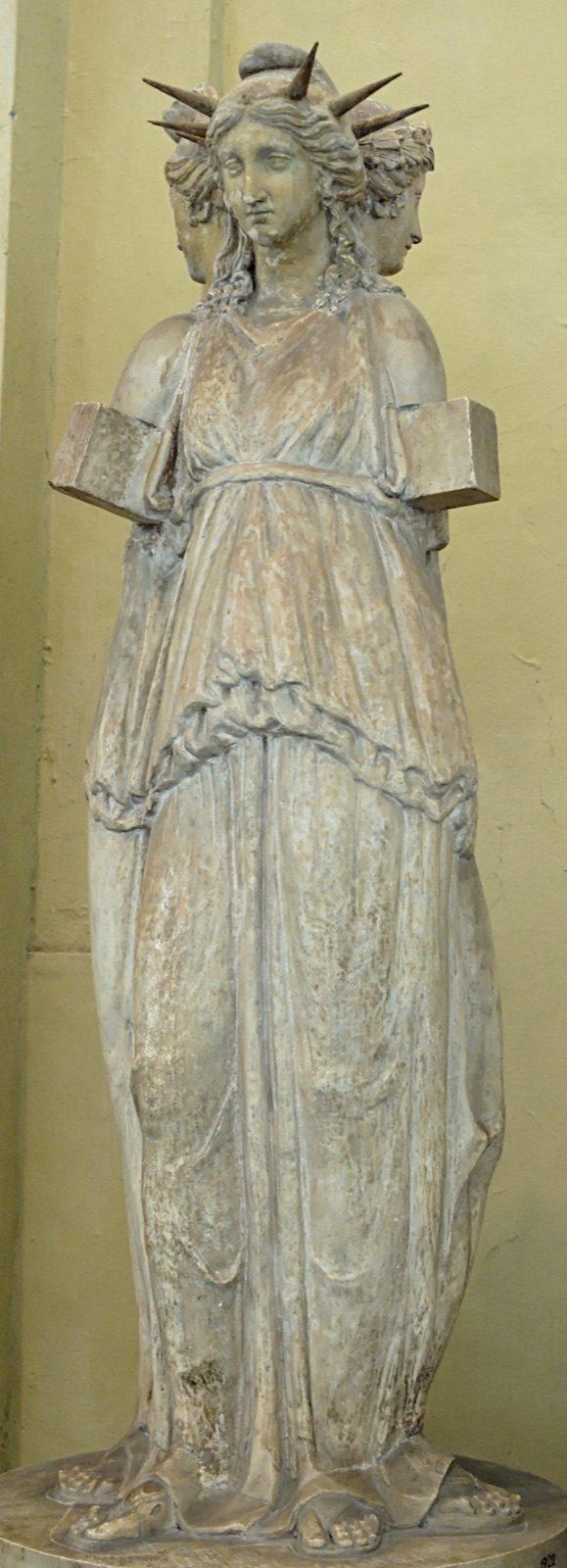 Roman marble copy, after a Hellenistic original, of a triple-formed statue of Hecate, showing three female figures standing back to back around a central column. Now in the Museo Chiaramonti, Vatican Museums.