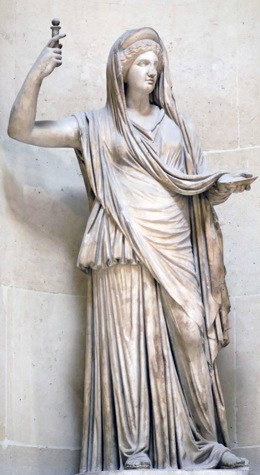 The Campana Hera, a 2nd-century AD Roman imperial marble statue of Hera with a central hair parting and a diadem, in the collection of the Louvre.