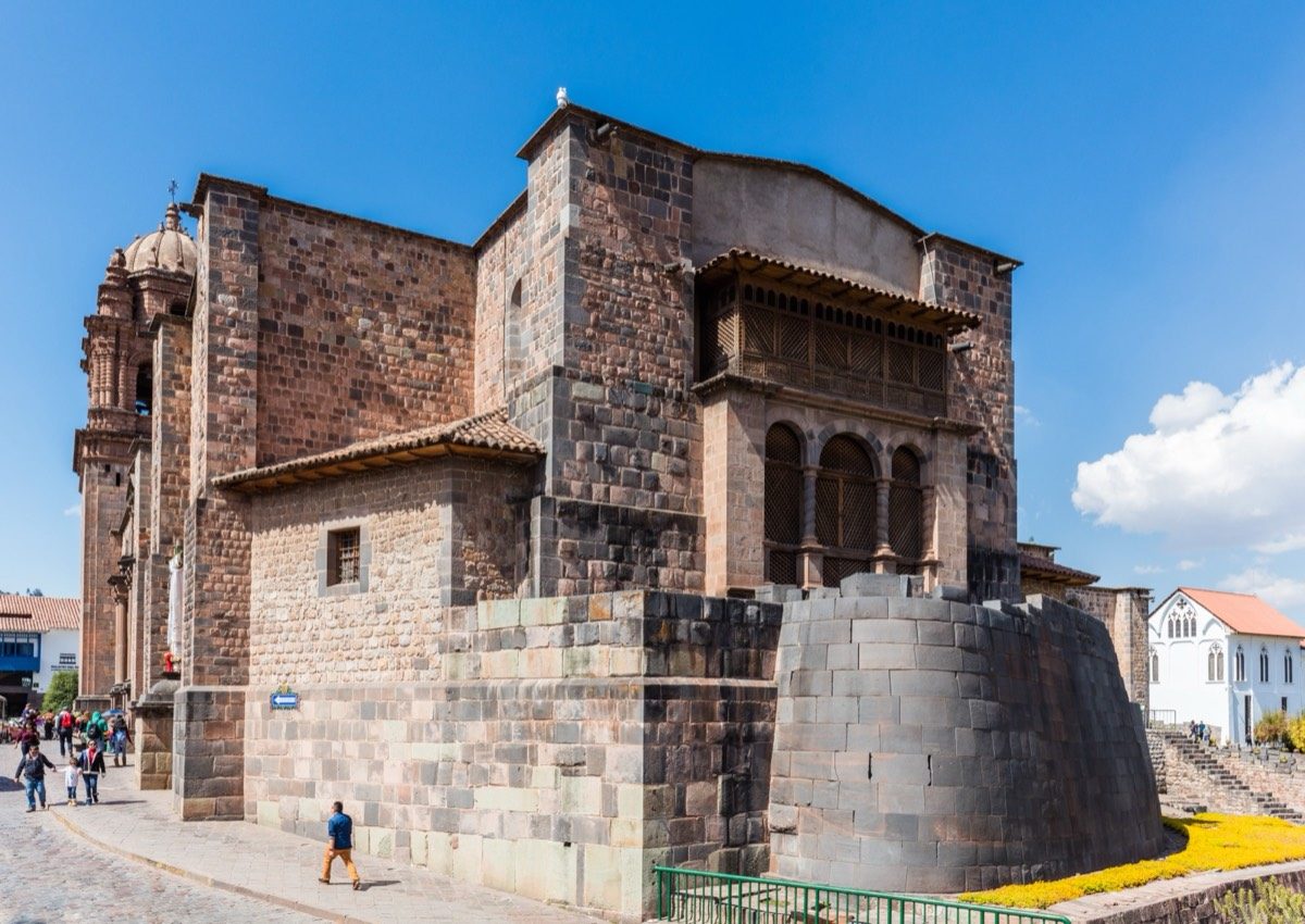 The Coricancha, the Inca Temple of the Sun in Cusco, Peru, showing the curved Inca stone masonry foundation with the colonial Santo Domingo convent built on top.