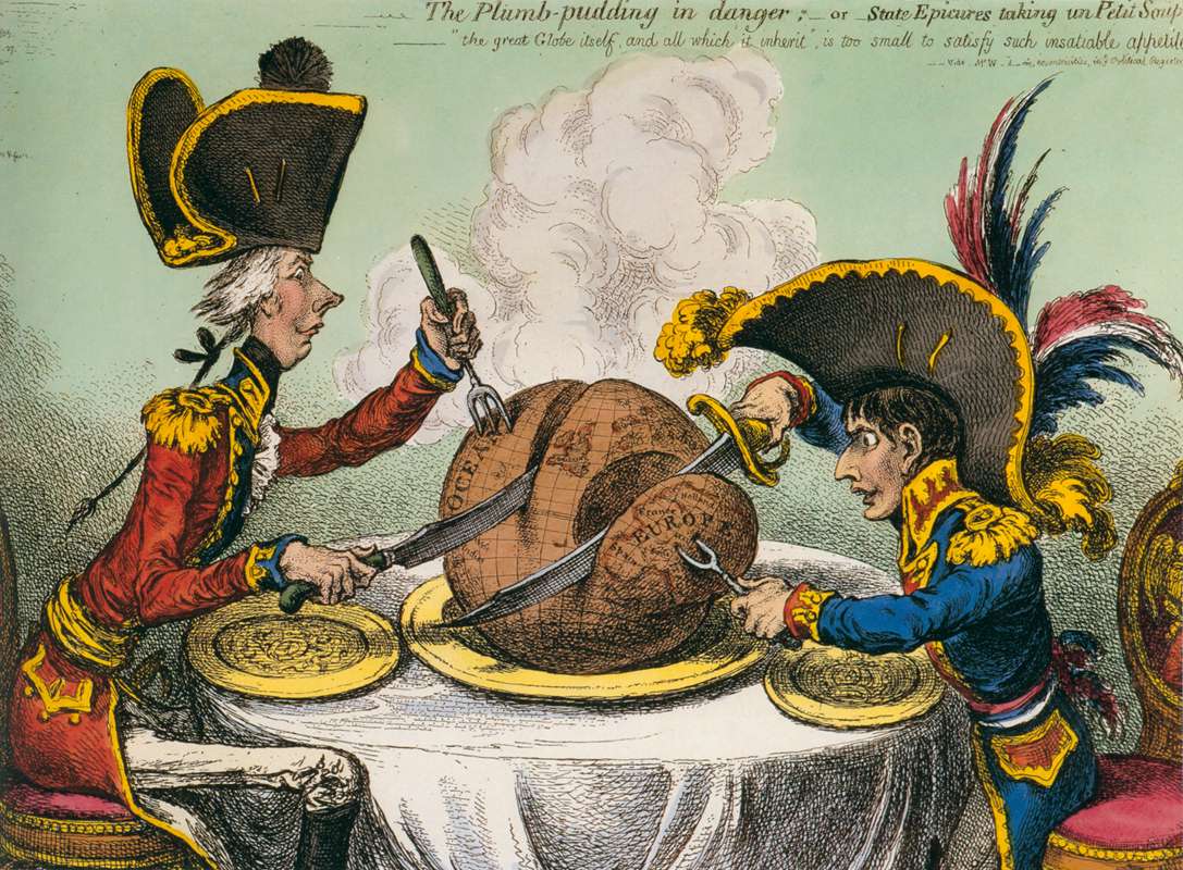 The Plum-Pudding in Danger, an 1805 hand-colored etching by James Gillray showing British Prime Minister William Pitt the Younger and Napoleon seated at a dining table, each carving a slice from a globe-shaped plum pudding with an oversized knife and fork, Napoleon drawn small and stocky beside the tall, thin Pitt.