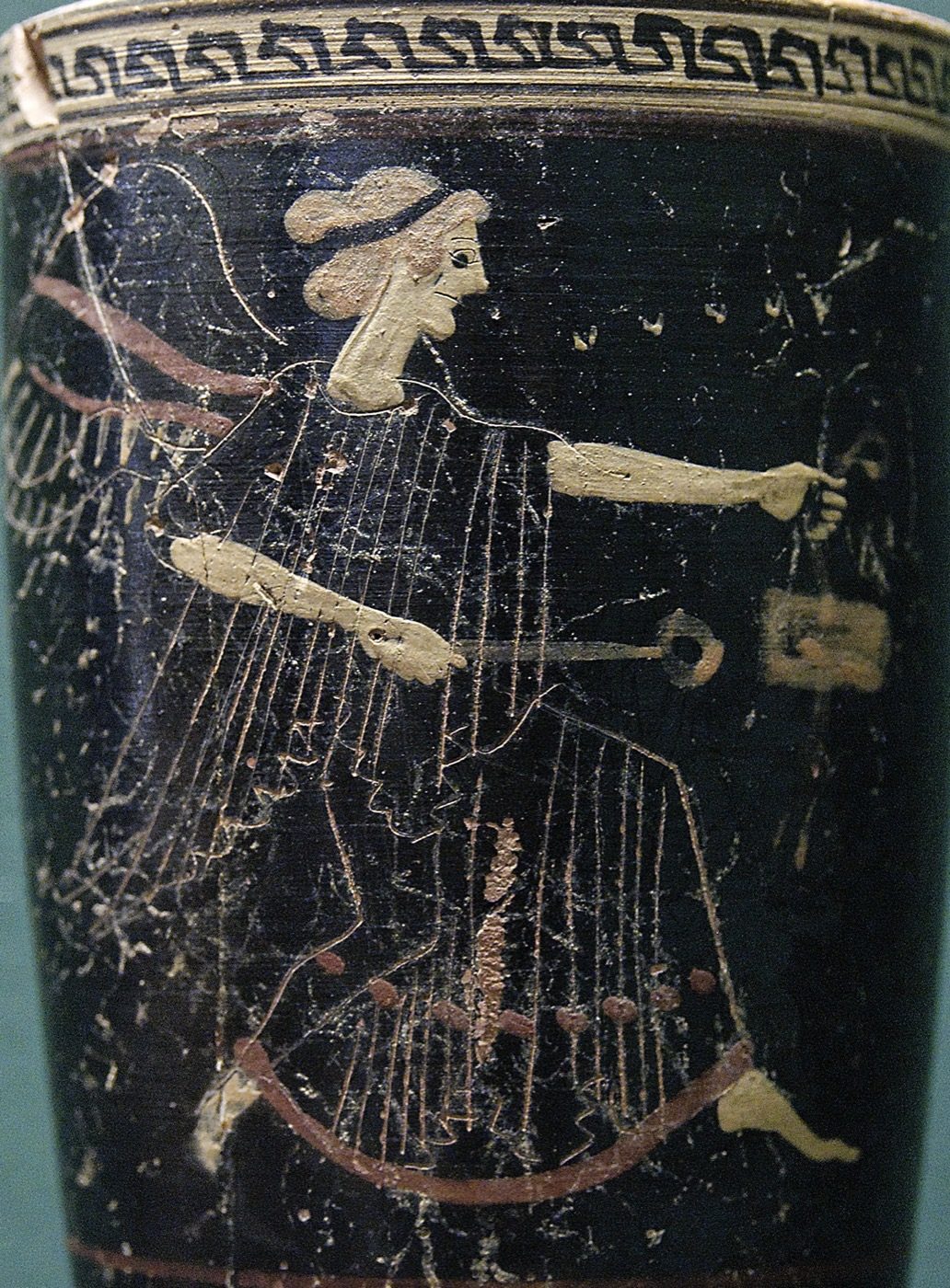 Iris depicted with wings and a herald's staff on an Attic lekythos in Six's technique, a black-figure-family polychrome technique, circa 500-490 BC, found at Tanagra and now in the Louvre.